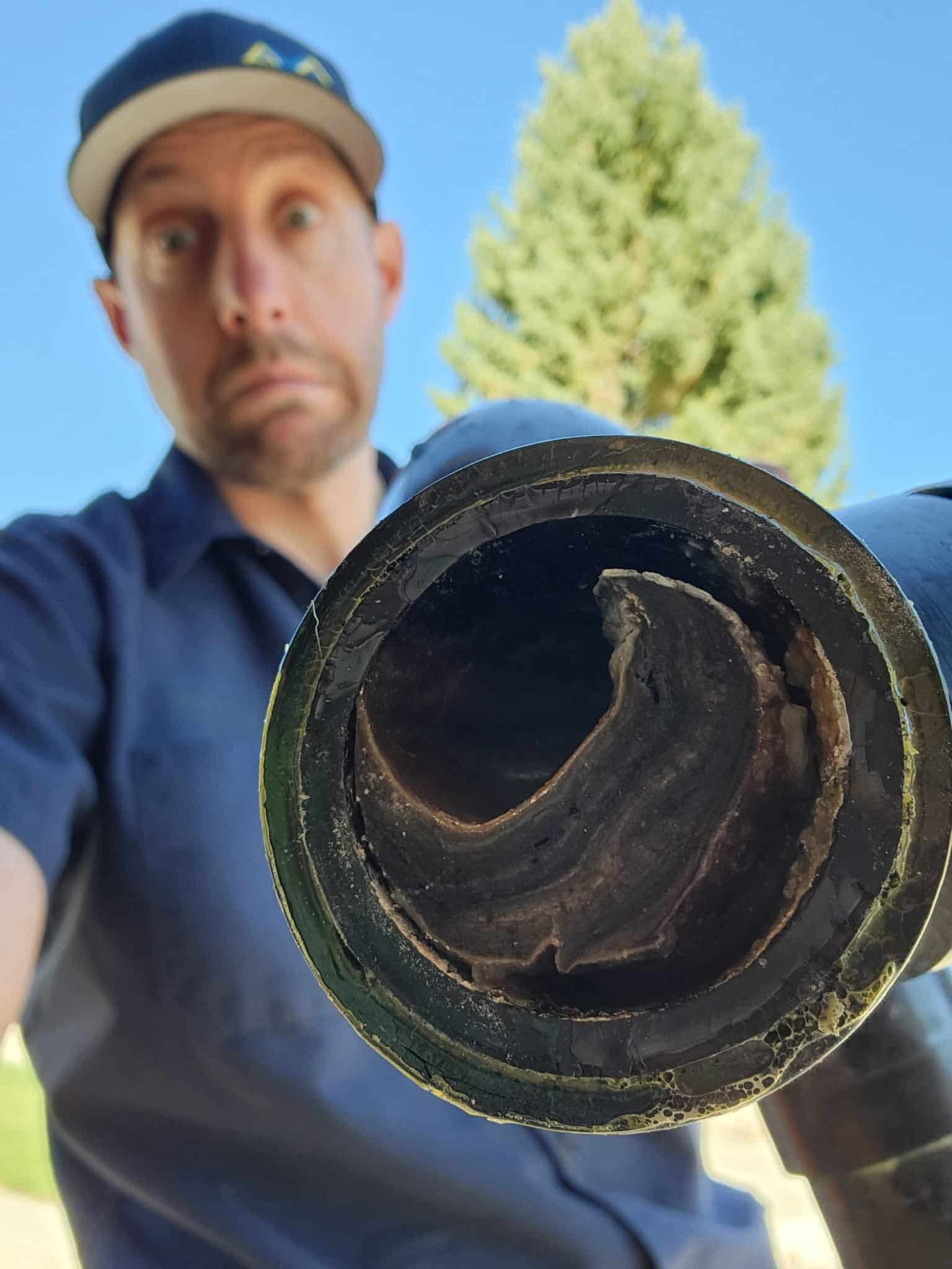 A blocked drain pipe pulled apart by Accent Plumbing and Heating